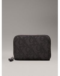 Calvin Klein - Cartera con cremallera en el contorno y jacquard con logo - Lyst