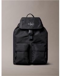 Calvin Klein - Nylon Monogram Logo Top Flap Backpack - Lyst
