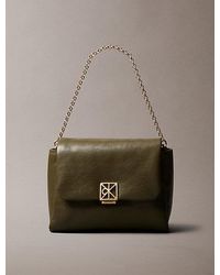 Calvin Klein - Padded Emblem Hardware Crossbody Bag - Lyst