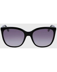Calvin Klein - Rechteckige Sonnenbrille CK23500S - Lyst