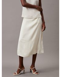 Calvin Klein - Shiny Satin Midi Wrap Skirt - Lyst