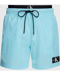 Calvin Klein - Short de bain court avec double ceinture - CK Monogram - Lyst