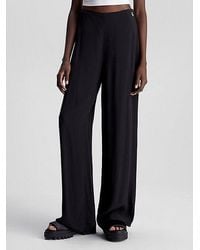 Calvin Klein - Pantalones de pernera ancha y chifón - Lyst