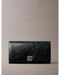 Calvin Klein - Emblem Logo Bifold Wallet - Lyst