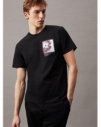 Calvin Klein - T-Shirt mit Blumen-Grafik - Lyst