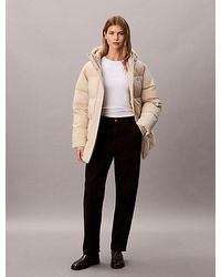Calvin Klein - Pufferjack Met Capuchon En Riem Met Logo - Lyst