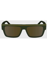 Calvin Klein - Aangepaste Rechthoekige Zonnebril Ckj24603s - Lyst