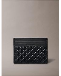 Calvin Klein - Embossed Allover Monogram Card Holder - Lyst
