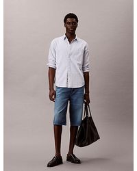 Calvin Klein - Relaxte Lange Denim Shorts - Lyst