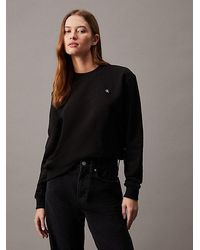 Calvin Klein - Sweatshirt CK EMBRO BADGE CREWNECK mit Logopatch - Lyst