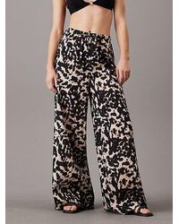 Calvin Klein - Pantalones de playa de algodón estampados - Lyst