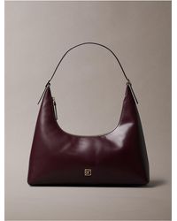 Calvin Klein - Monogram Logo Emblem Leather Shoulder Bag - Lyst