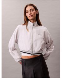 Calvin Klein - Calvin Klein Woven Cropped Relaxed Track Jacket - Lyst