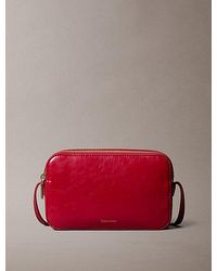 Calvin Klein - Glossy Foil Logo Crossbody Camera Bag - Lyst