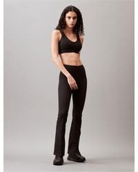 Calvin Klein - Performance Embrace High Waist Flared Pants - Lyst