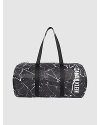 Calvin Klein Bolso duffle unisex estampado - Negro