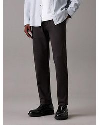 Calvin Klein - Tapered-Strick-Hose Mit Bundfalten - Lyst