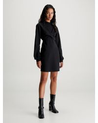 Calvin Klein - Robe portefeuille à manches longues en jersey - Lyst