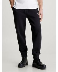 Calvin Klein - Pantalón de chándal de felpa con monograma - Lyst
