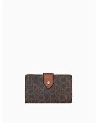 Calvin Klein Wallets and cardholders for Women - Up to 65% off at Lyst.com