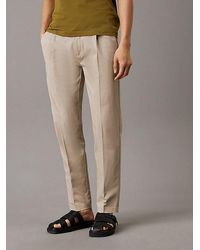 Calvin Klein - Tapered Chino-Hose Mit Bundfalten - Lyst