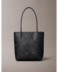 Calvin Klein - Petit Sac Cabas Entièrement Paré De Logos Monogrammes Gaufrés - Lyst