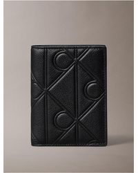 Calvin Klein - Embossed Emblem Logo Slim Bifold Wallet - Lyst