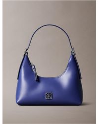 Calvin Klein - Monogram Logo Emblem Leather Small Shoulder Bag - Lyst