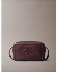 Calvin Klein - Embossed Monogram Logo Camera Bag - Lyst