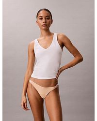 Calvin Klein - Dipped String Thong Icon Logo - Lyst