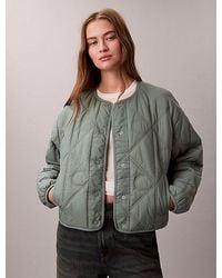 Calvin Klein - Jeans Allover Emblem Logo Quilted Liner Jacket - Lyst