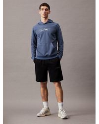 Calvin Klein - Kurze Sporthose aus French-Terry - Lyst
