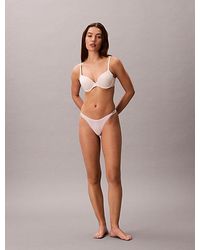 Calvin Klein - Dipped String Thong Icon Logo - Lyst
