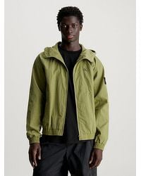 Calvin Klein - Jacke mit Kapuze aus strukturiertem Nylon - Lyst