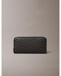 Calvin Klein - Allover Emblem Logo Zip Wallet - Lyst