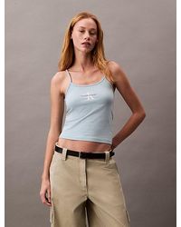 Calvin Klein - Top slim con monograma - Lyst