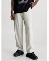 Calvin Klein - Pantalones rectos de nailon técnico - Lyst