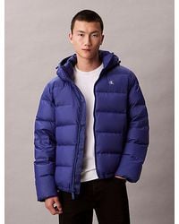 Calvin Klein - Chaqueta de plumas con capucha - Lyst