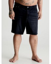 Calvin Klein - Shorts denim de talla grande - Lyst