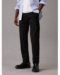 Calvin Klein - Tapered Chino-Hose Mit Bundfalten - Lyst