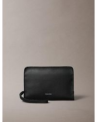 Calvin Klein - Embossed Foil Logo Pouch - Lyst