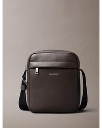 Calvin Klein - Logo Pebbled Crossbody Reporter Bag - Lyst