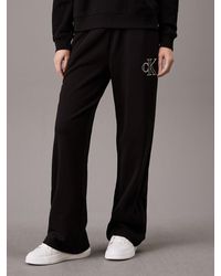 Calvin Klein - Pantalon de jogging jambe large à monogramme - Lyst