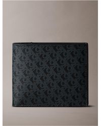 Calvin Klein - Allover Monogram Logo Matte Bifold Wallet - Lyst