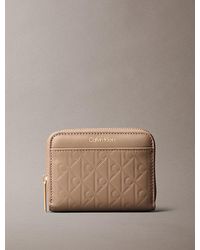 Calvin Klein - Embossed Emblem Logo Zip Wallet - Lyst
