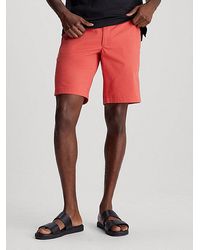 Calvin Klein - Shorts slim con cinturón de sarga - Lyst