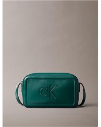 Calvin Klein - Embossed Monogram Logo Camera Bag - Lyst
