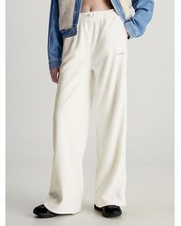 Calvin Klein - Pantalón de chándal de forro polar de pierna ancha - Lyst