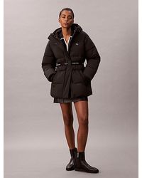 Calvin Klein - Pufferjack Met Capuchon En Riem Met Logo - Lyst
