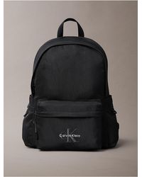 Calvin Klein - Nylon Monologo Round Backpack - Lyst
